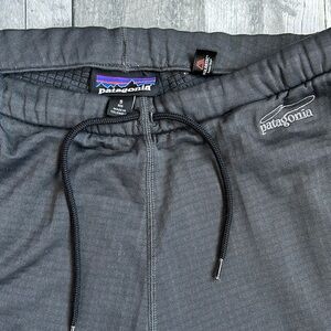 Mens Patagonia sweat pants dark grey size small small hole on the end of leg